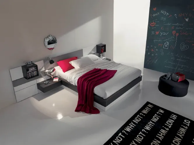 Letto in legno e laccato con testiera a boiserie modulare e contenitore Plan di Fimar